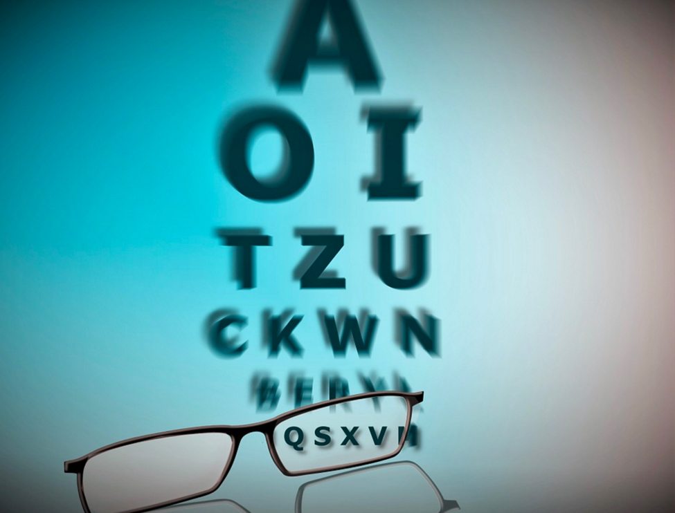 Eye chart for an eye exam with a pair of glasses at the bottom of the image.